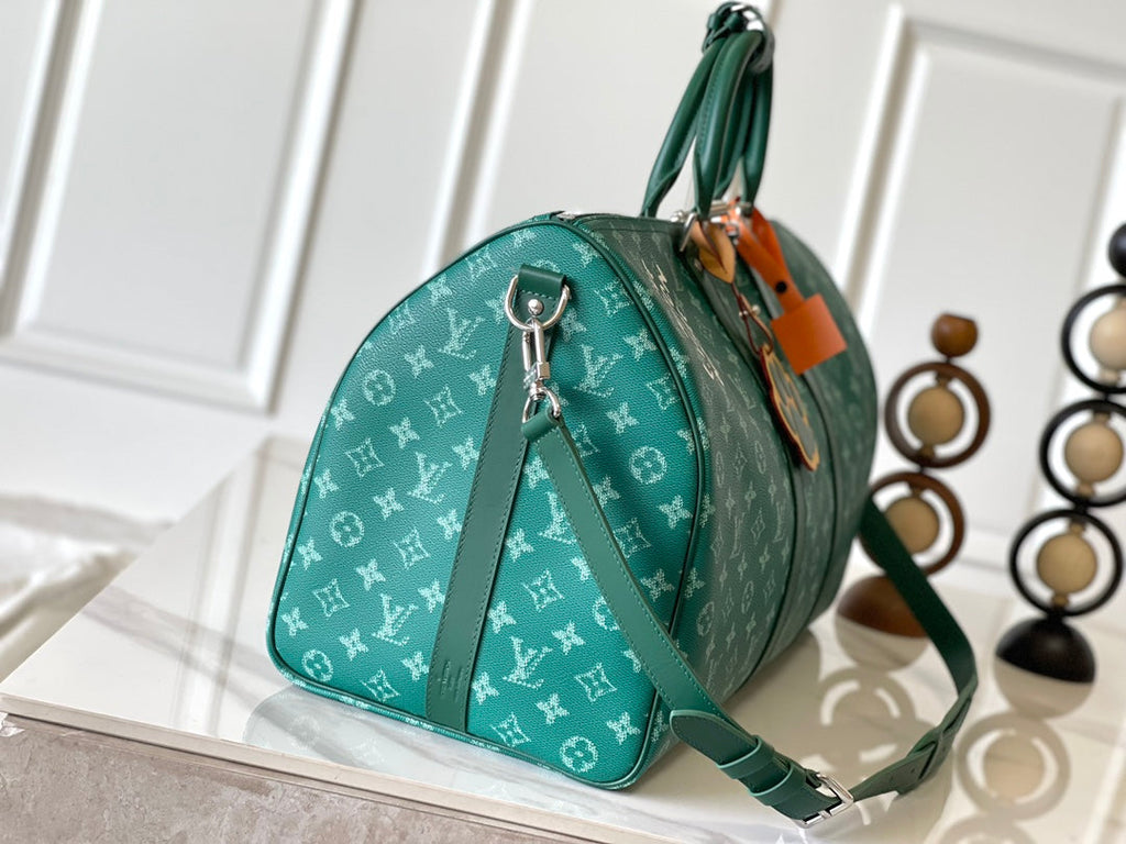 LOUIS VUITTON KEEPALL BANDOULIÈRE 50 IN GREEN MONOGRAM HERITAGE CANVAS