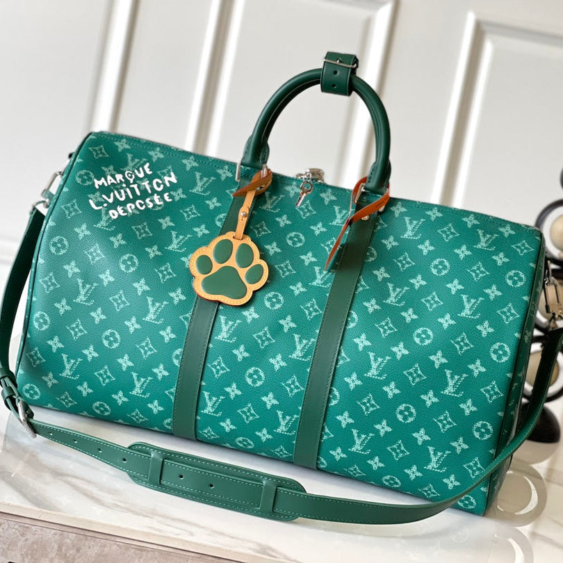 LOUIS VUITTON KEEPALL BANDOULIÈRE 50 IN GREEN MONOGRAM HERITAGE CANVAS
