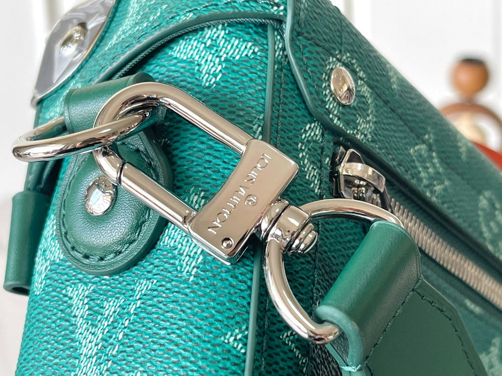 LOUIS VUITTON SOUL TRUNK 19 IN GREEN MONOGRAM HERITAGE CANVAS SILVER HARDWARE