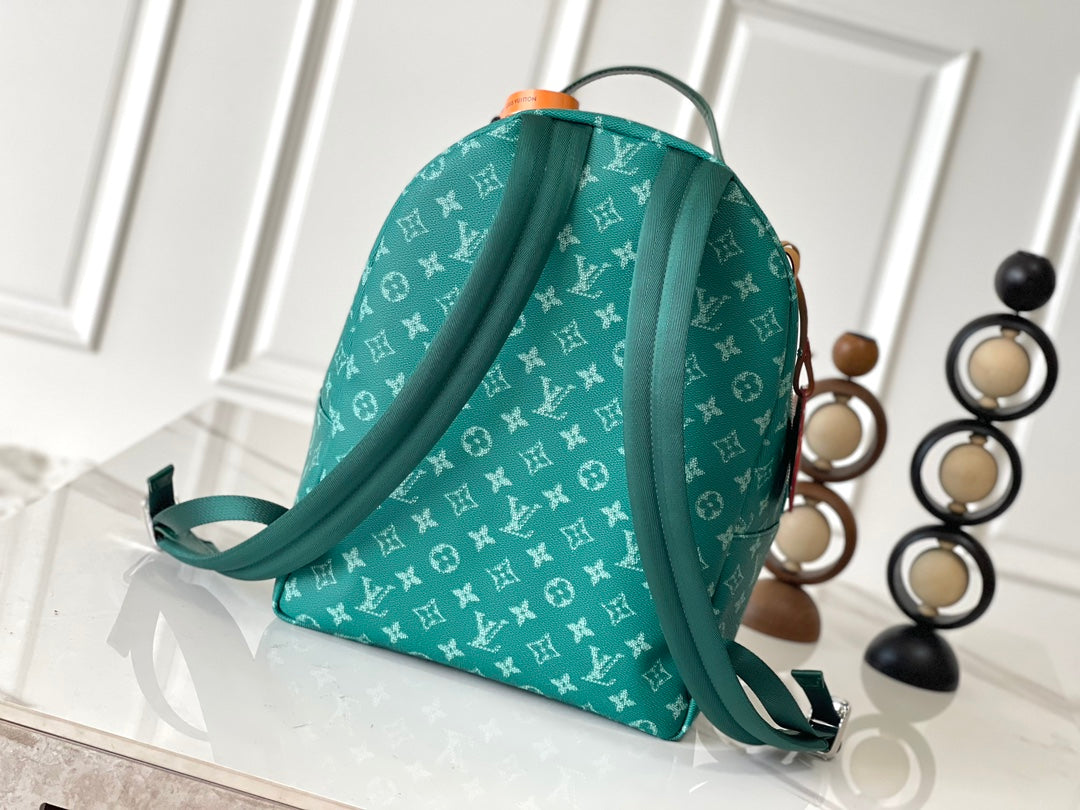 LOUIS VUITTON DISCOVERY BACKPACK 38 IN GREEN MONOGRAM HERITAGE CANVAS