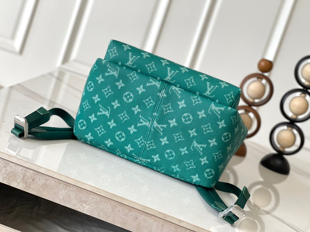 LOUIS VUITTON DISCOVERY BACKPACK 38 IN GREEN MONOGRAM HERITAGE CANVAS