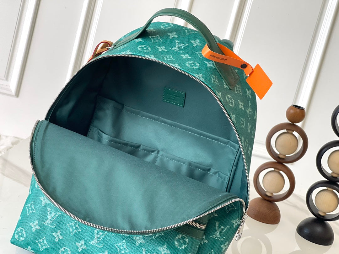 LOUIS VUITTON DISCOVERY BACKPACK 38 IN GREEN MONOGRAM HERITAGE CANVAS