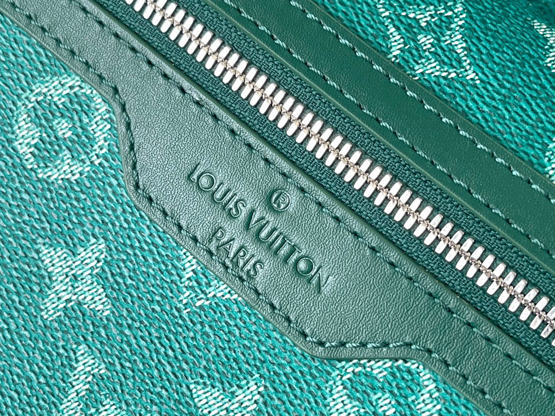 LOUIS VUITTON DISCOVERY BACKPACK 38 IN GREEN MONOGRAM HERITAGE CANVAS