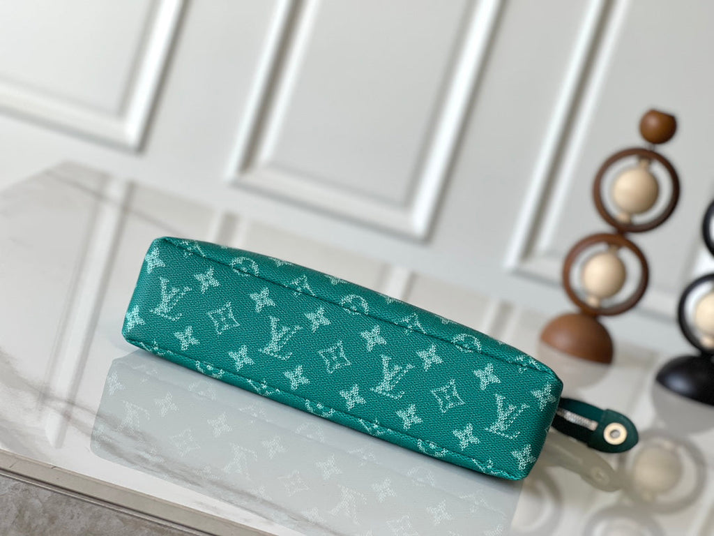 LOUIS VUITTON POCHETTE VOYAGE SOUPLE 32 IN GREEN MONOGRAM HERITAGE CANVAS
