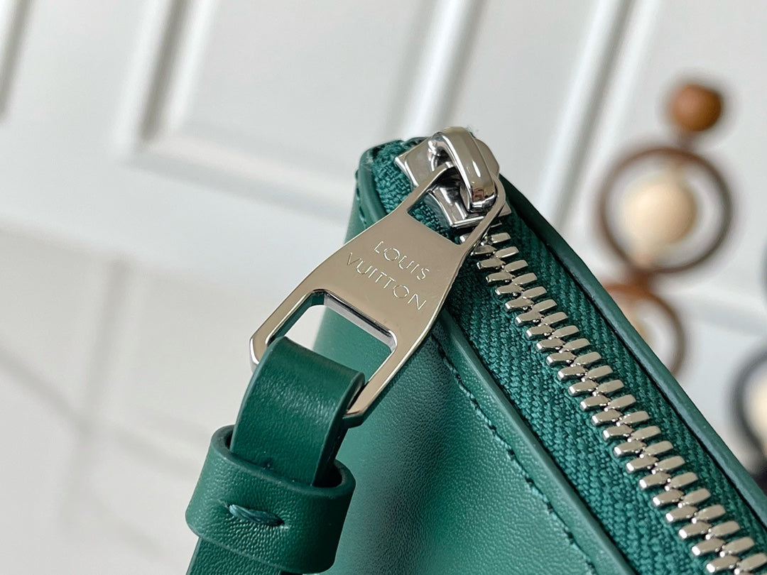 LOUIS VUITTON POCHETTE VOYAGE SOUPLE 32 IN GREEN MONOGRAM HERITAGE CANVAS