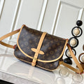 LOUIS VUITTON SAUMUR BB 28 IN BROWN MONOGRAM CANVAS AND LEATHER TRIM GOLD HARDWARE