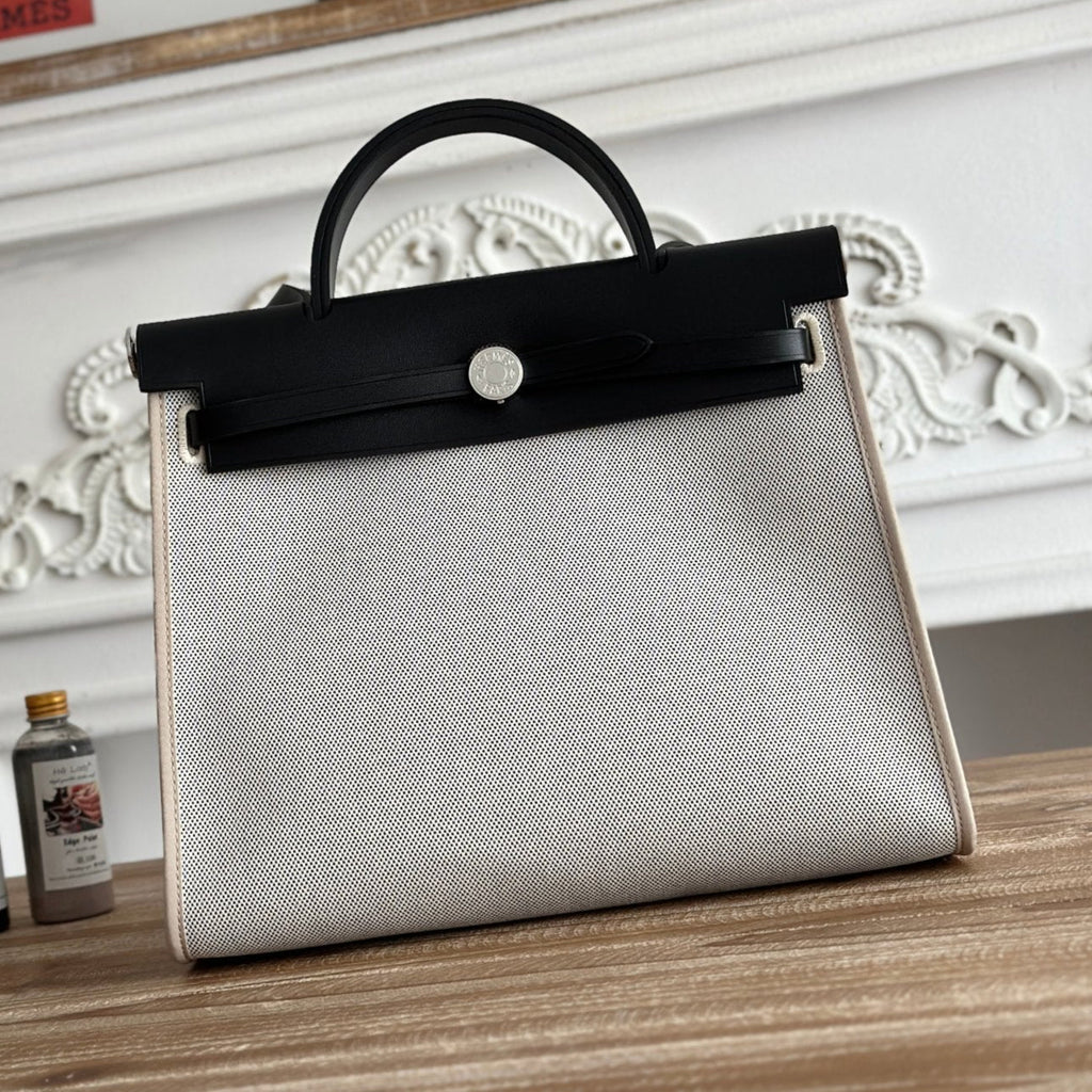 HERMES ZIP CABINE 31 BAG IN PALE GRAY CANVAS AND BLACK CALFSKIN
