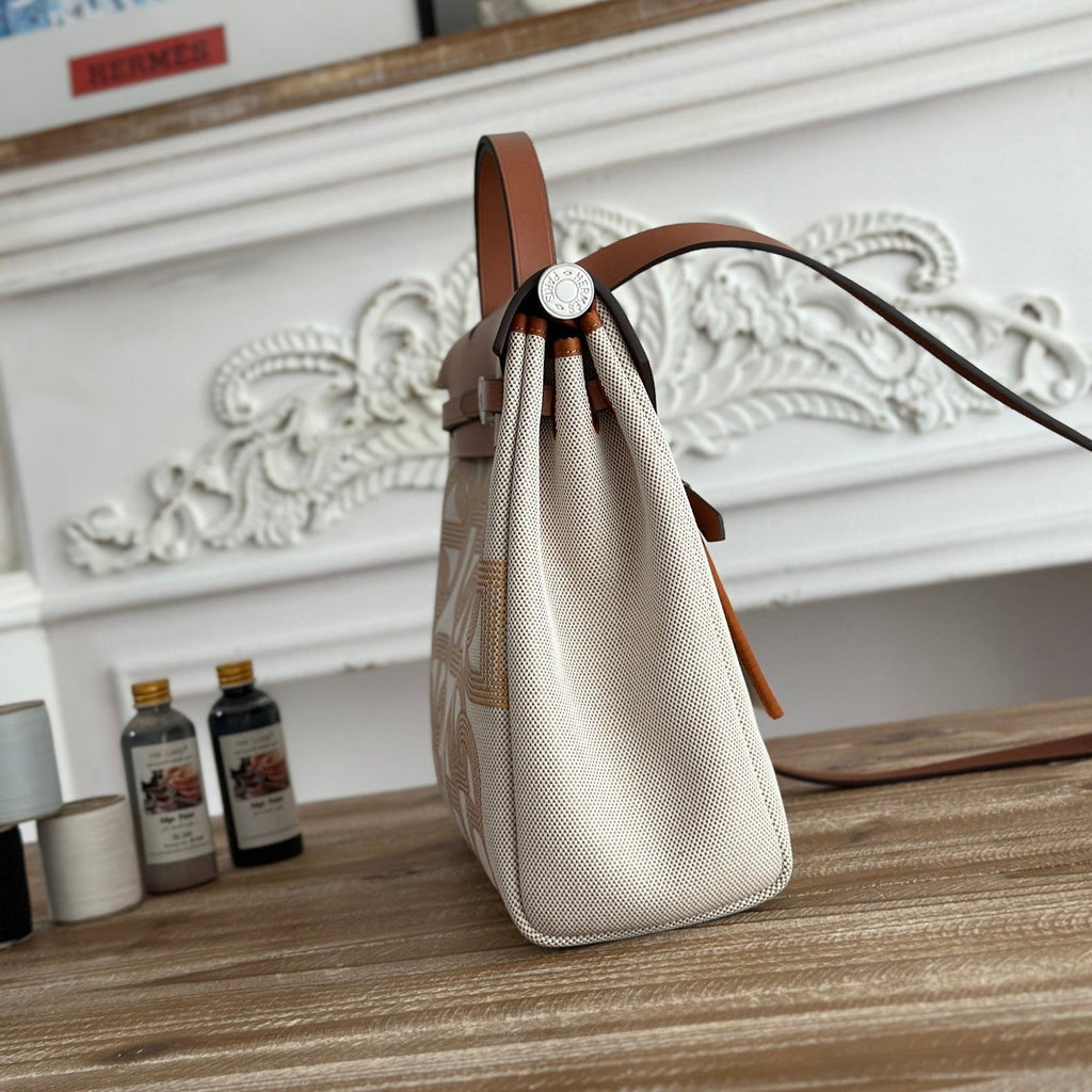 HERMES HERBAG ZIP 31 LAQUERED BAG IN OFF-WHITE MIX YELLOW H PLUME CANVAS