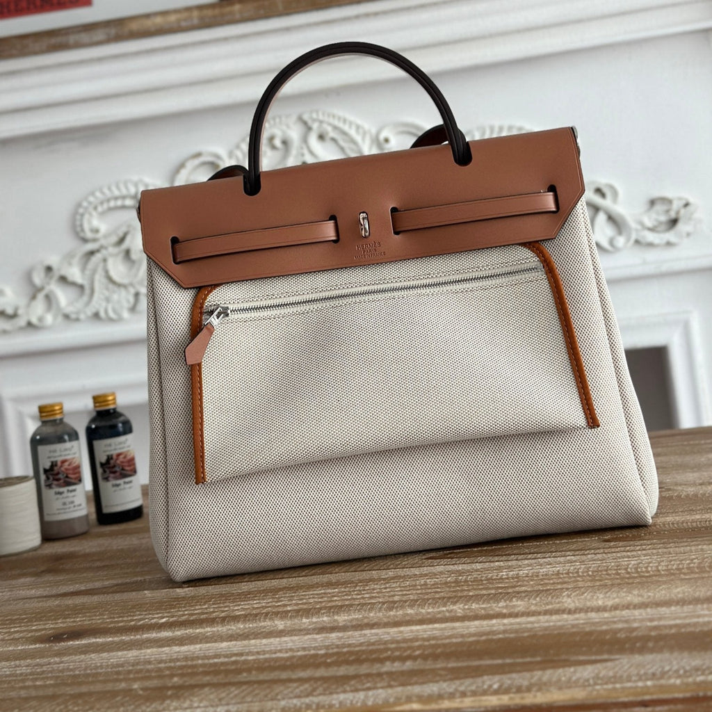 HERMES HERBAG ZIP 31 LAQUERED BAG IN OFF-WHITE MIX YELLOW H PLUME CANVAS