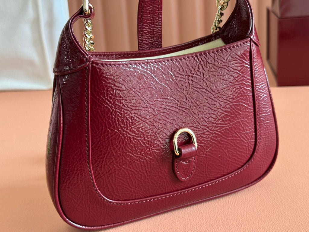 GUCCI JACKIE NOTTE MINI BAG 19 IN RED WINE CRACKED LACQUER CALFSKIN GOLD HARDWARE
