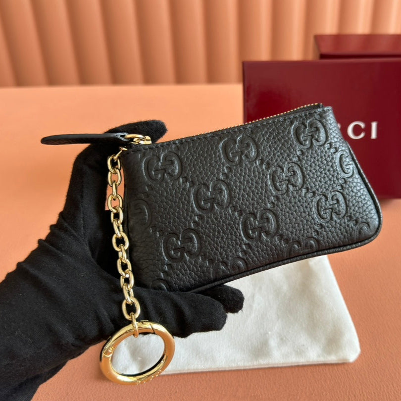 GUCCI EMBLEM ZIP KEY CASE 12 IN BLACK  GRAINY CALFSKIN