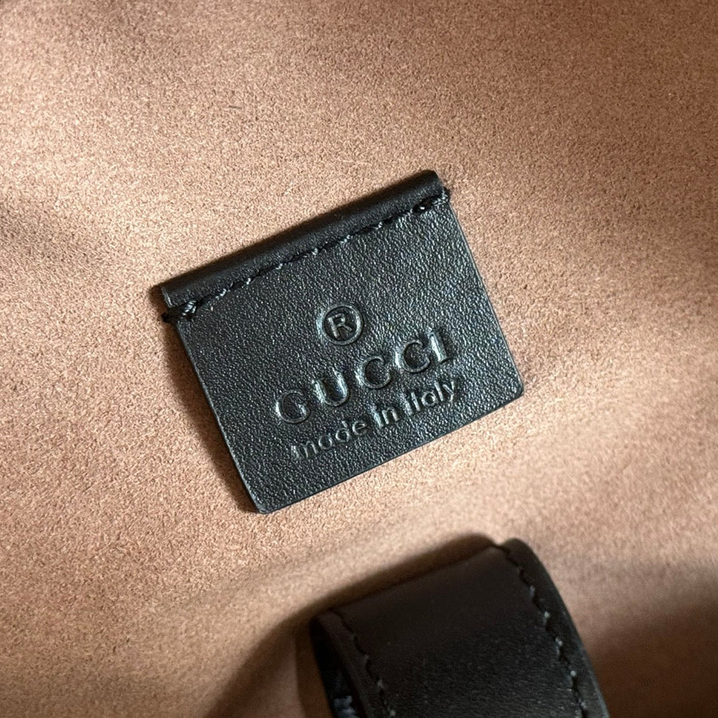 GUCCI EMBOSSED BACKPACK 40 IN BEIGE AND DARK BROWN CALFSKIN