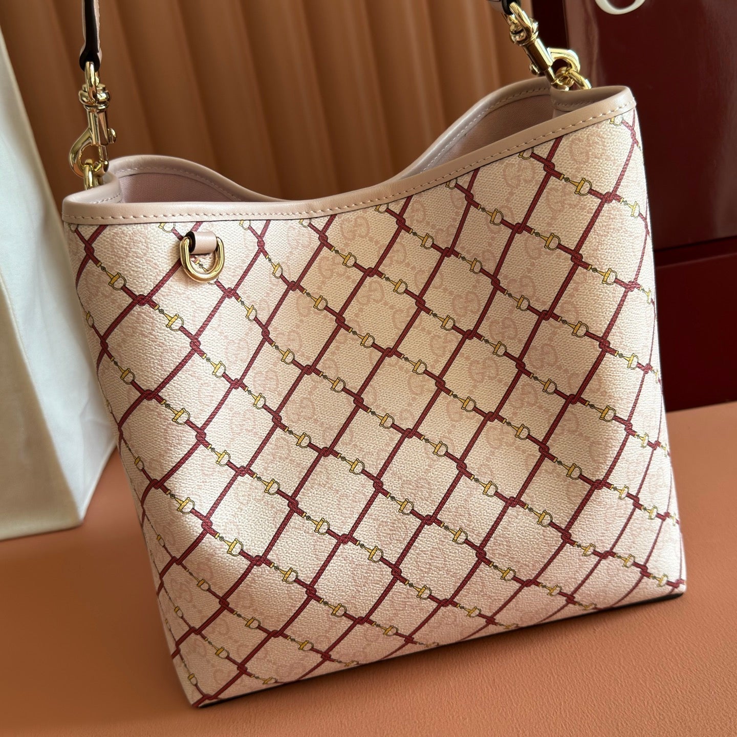 GUCCI 26S  EMBLEM BUCKET BAG 25 IN LIGHT PINK COATED FABRIC
