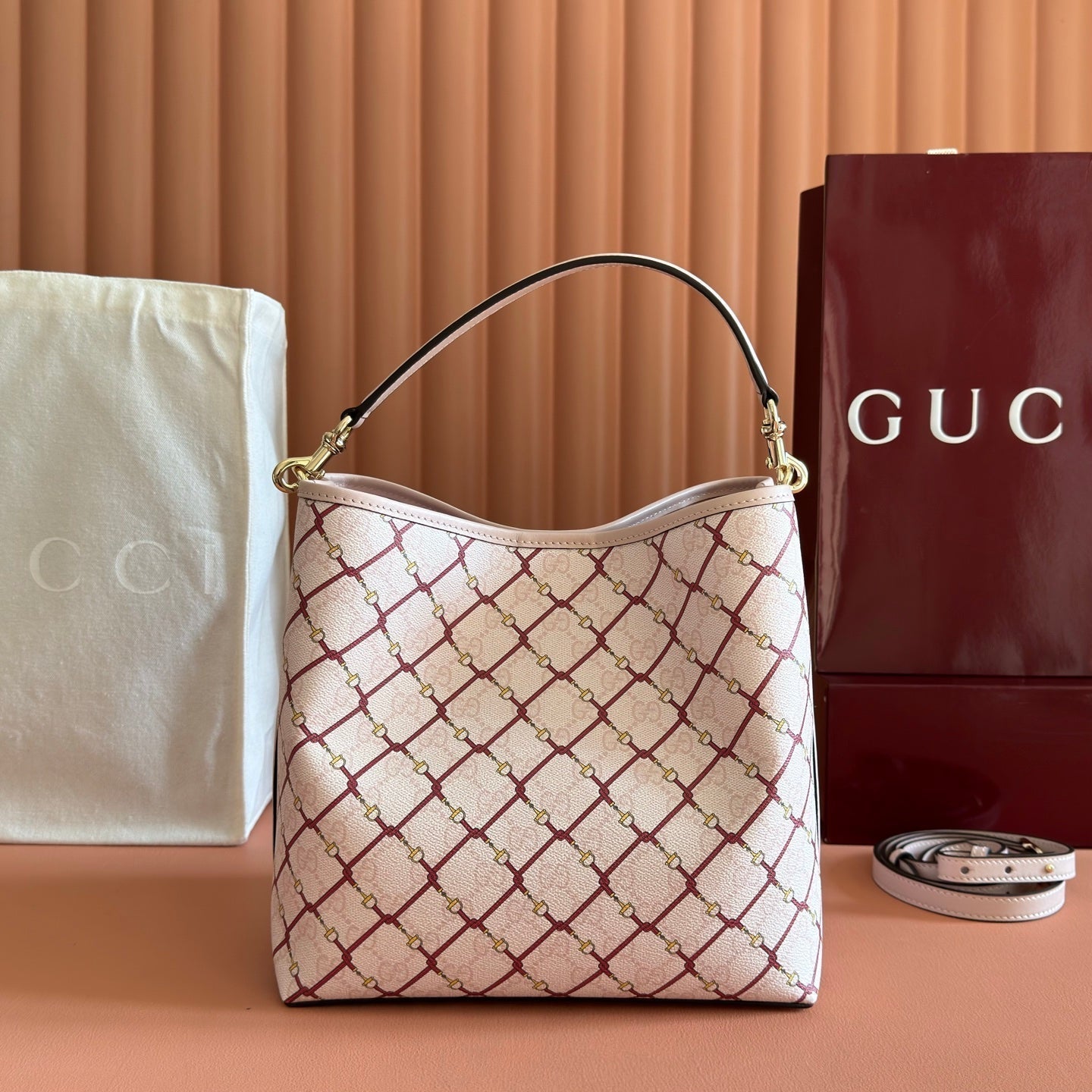 GUCCI 26S  EMBLEM BUCKET BAG 25 IN LIGHT PINK COATED FABRIC
