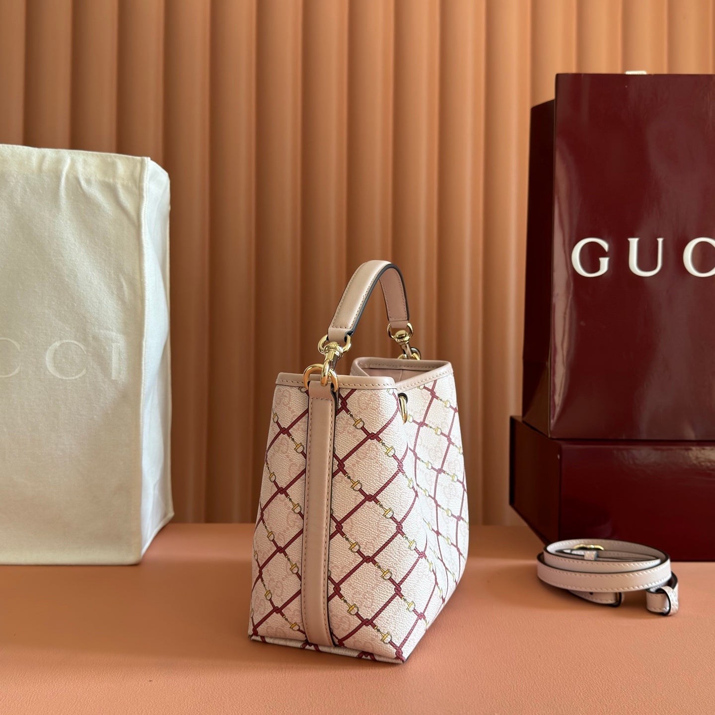 GUCCI 26S  EMBLEM BUCKET BAG 19 IN LIGHT PINK COATED FABRIC