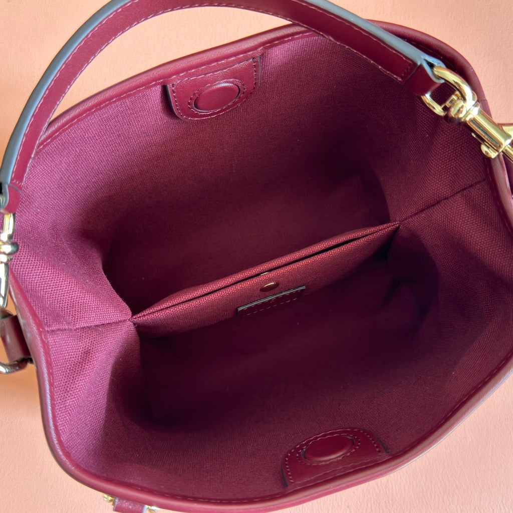 GUCCI 26S  EMBLEM BUCKET BAG 19 IN DARK RED COATED FABRIC