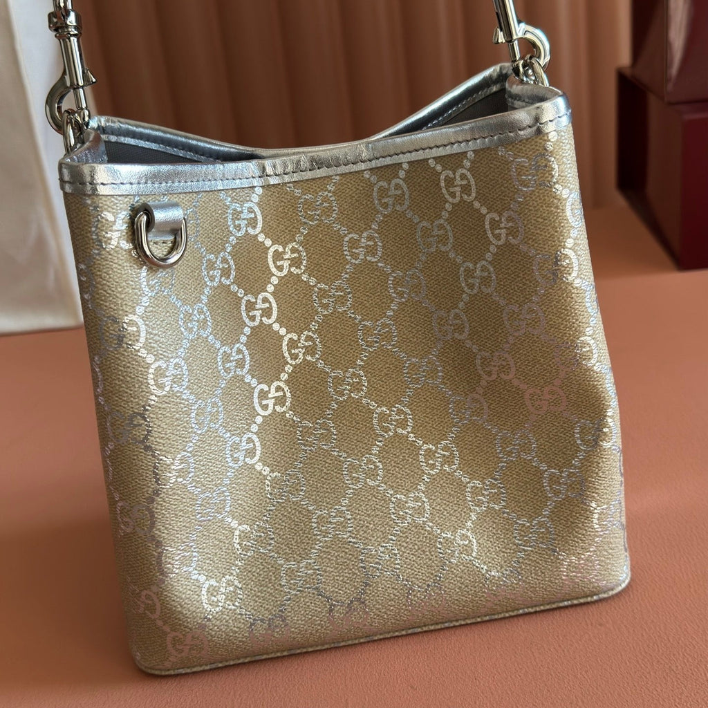 GUCCI 26S  EMBLEM BUCKET BAG 19 IN BEIGE AND SILVER CANVAS