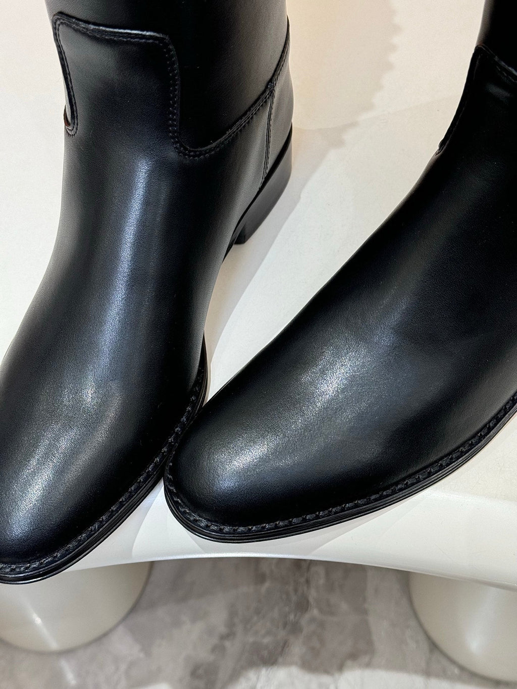 HERMES 25S KNEE-HIGH FLAT BOOTS IN BLACK LAMBSKIN WITH SILVER HARDWARE