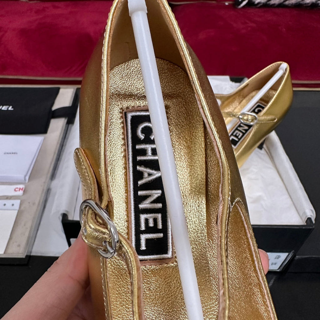 CHANEL HIGH MARY JANE IN GOLDEN CALFSKIN AND BLACK SATIN