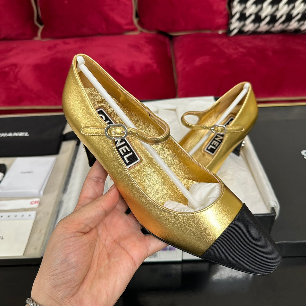 CHANEL HIGH MARY JANE IN GOLDEN CALFSKIN AND BLACK SATIN