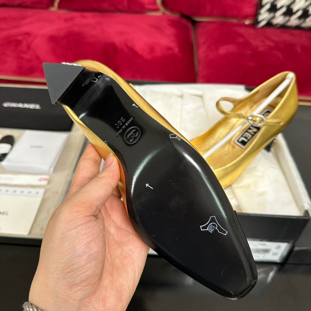 CHANEL HIGH MARY JANE IN GOLDEN CALFSKIN AND BLACK SATIN