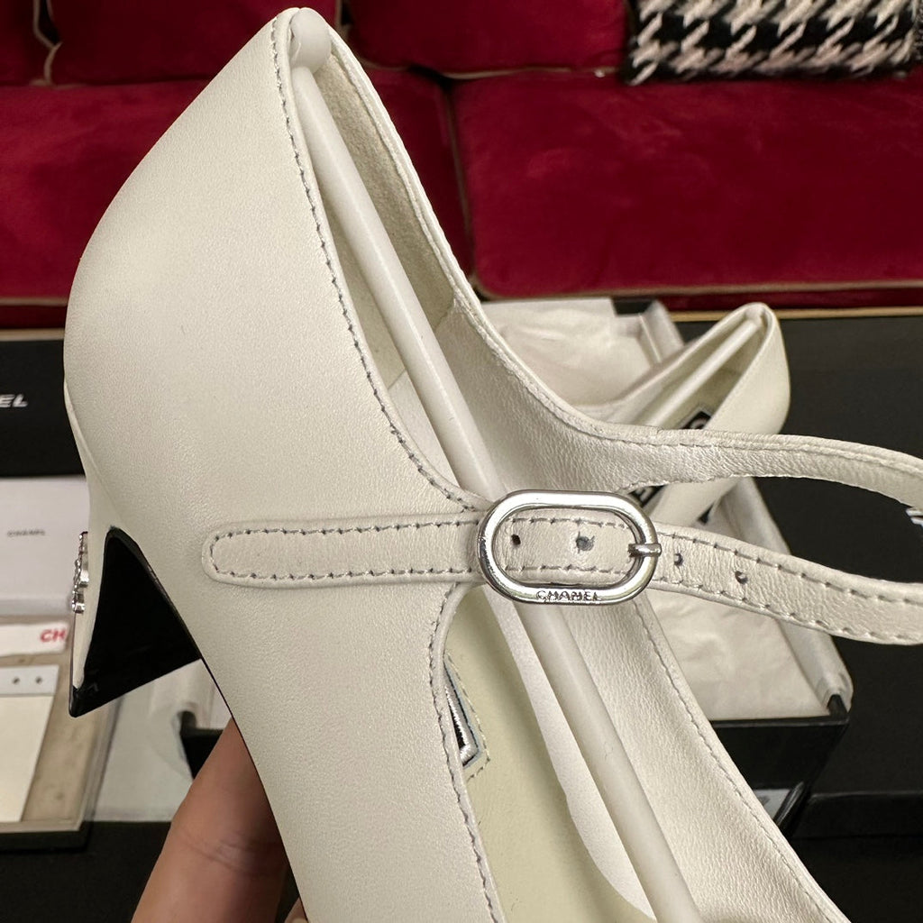 CHANEL HIGH MARY JANE IN WHITE CALFSKIN AND BLACK SATIN