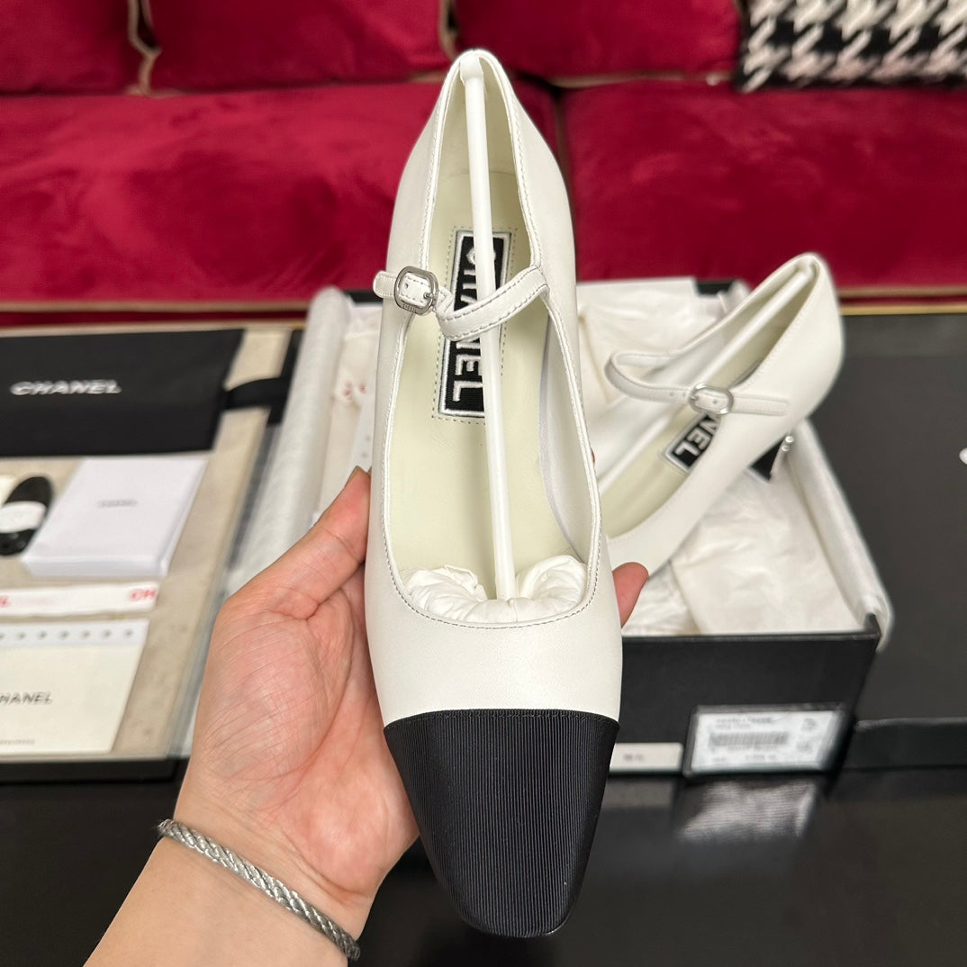 CHANEL HIGH MARY JANE IN WHITE CALFSKIN AND BLACK SATIN