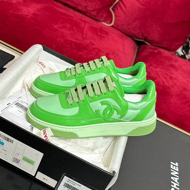CHANEL TRAINERS IN LIGHT GREEN SHINY CALFSKIN