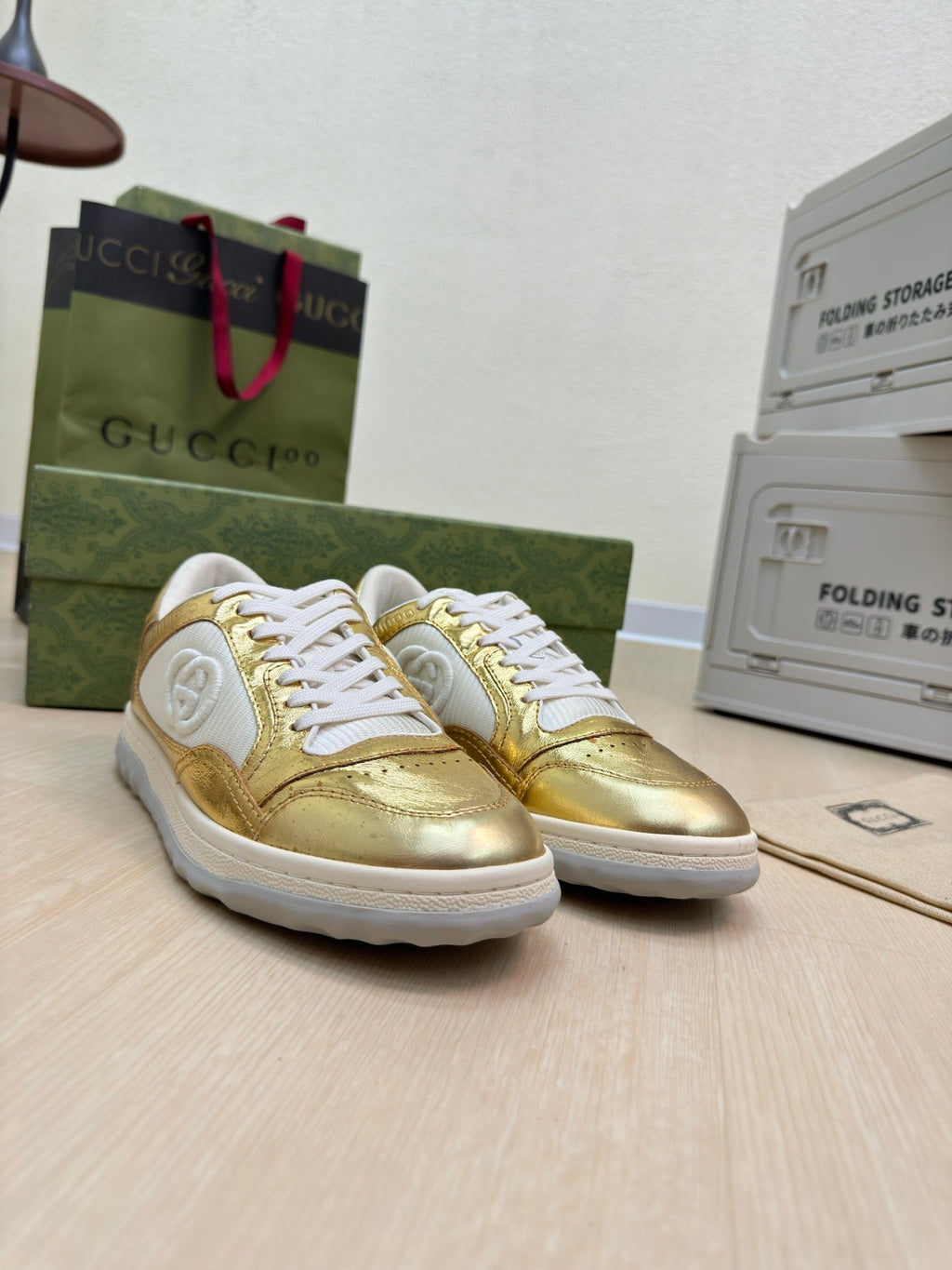 GUCCI INTERLOCKING G SNEAKER GOLD CALFSKIN AND FABRIC