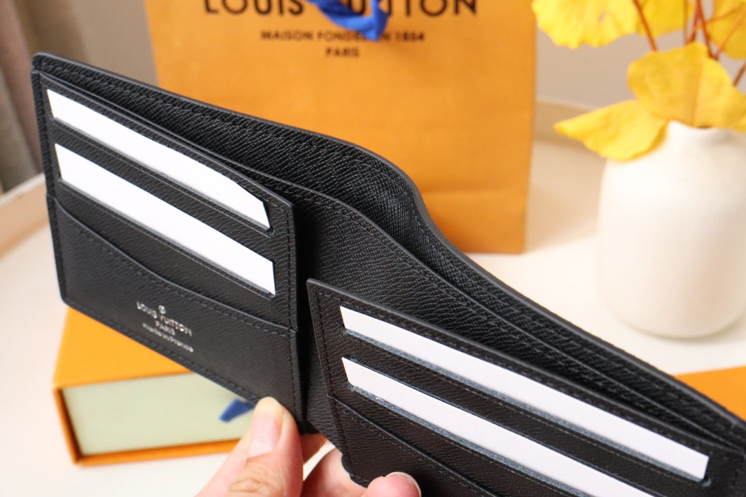 LOUIS VUITTON LV 25S SLENDER WALLET 11 IN BLACK TAIGA CALFSKIN