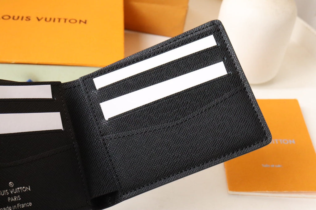 LOUIS VUITTON LV 25S SLENDER WALLET 11 IN BLACK TAIGA CALFSKIN