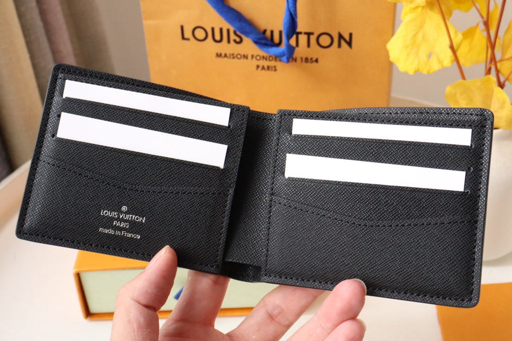 LOUIS VUITTON LV 25S SLENDER WALLET 11 IN BLACK TAIGA CALFSKIN