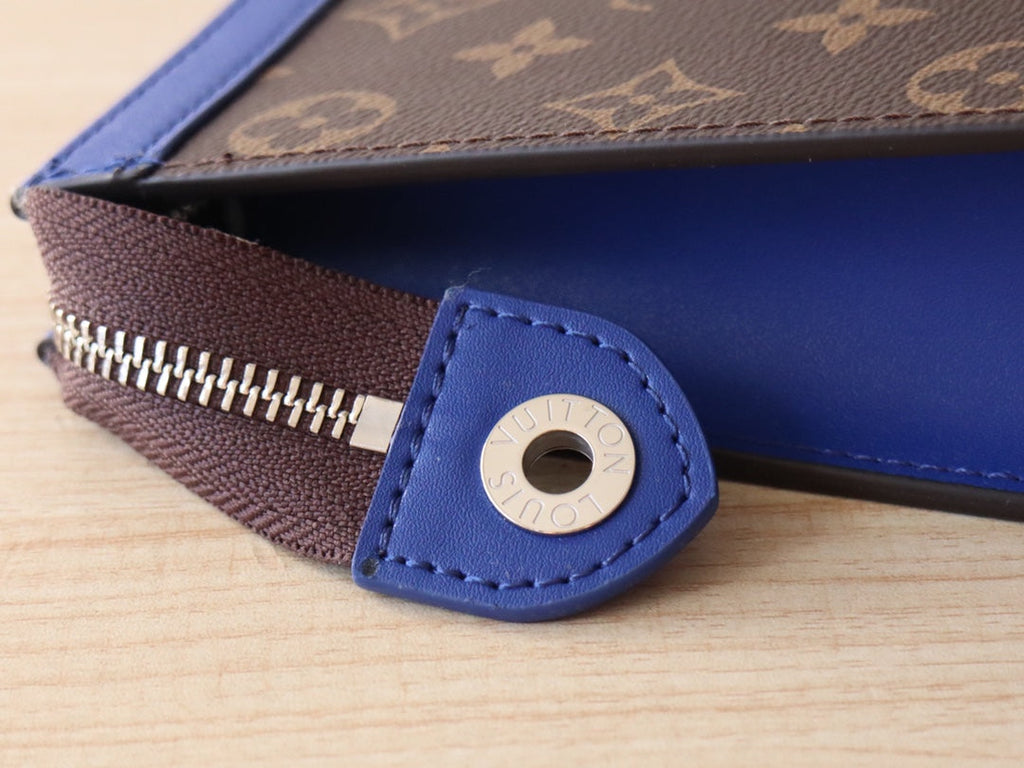 LOUIS VUITTON LV 25S POCHETTE VOYAGE 26 IN INDIGO BLUE MONOGRAM MACASSAR COATED CANVAS