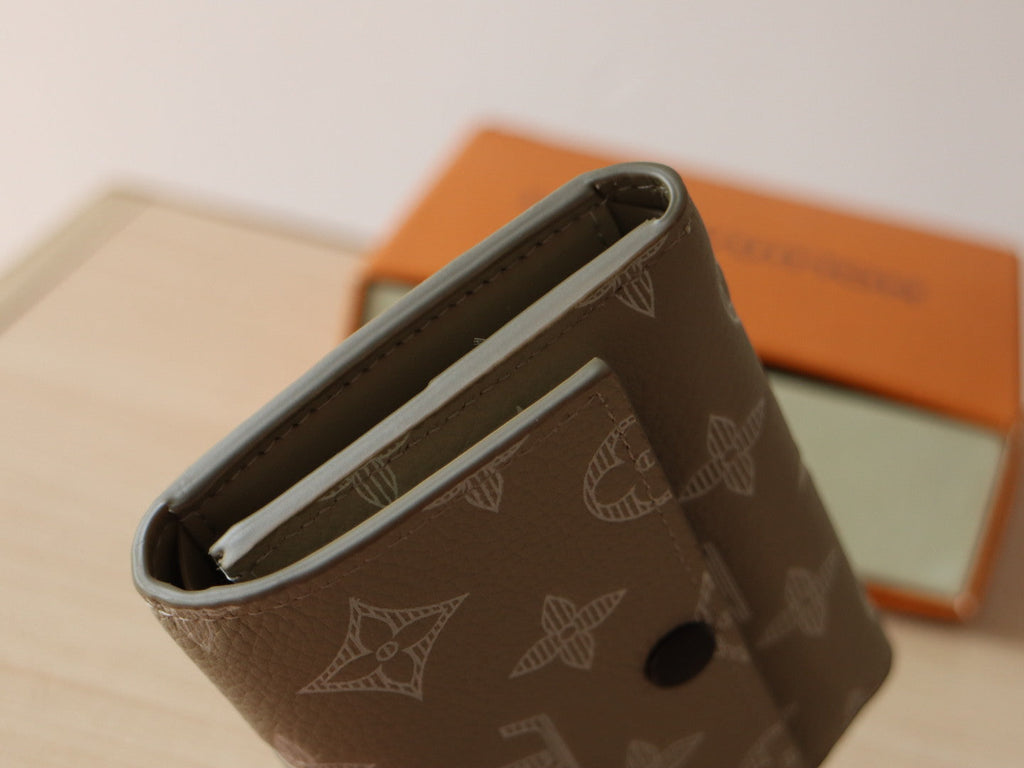 LOUIS VUITTON IRIS WALLET IN KHAKI BROWN EMBOSSED CALFSKIN