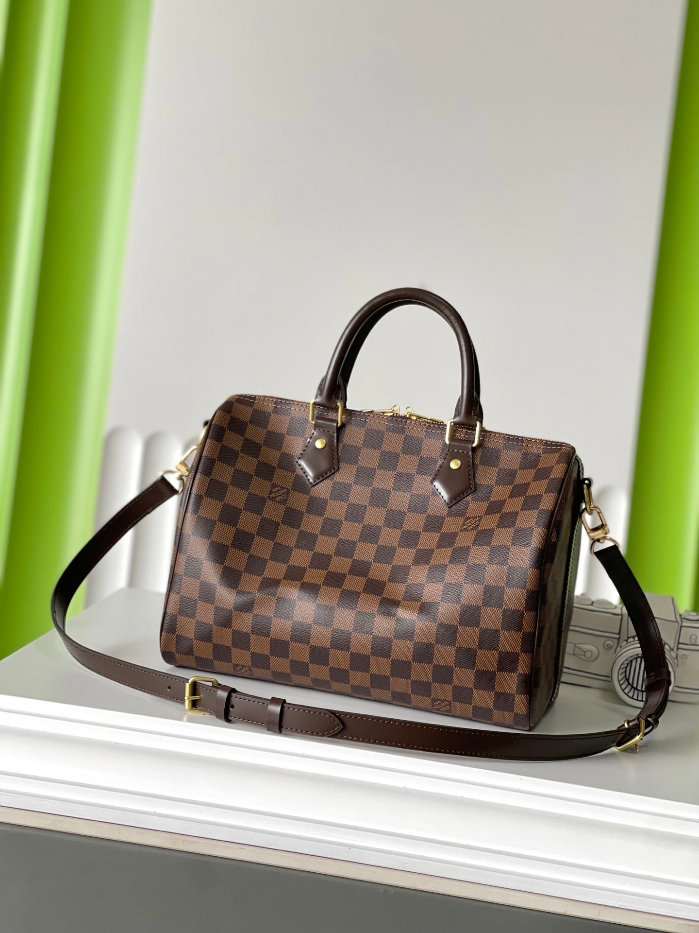 LOUIS VUITTON SPEEDY BANDOLIÈRE 30 IN DARK BROWN DAMIER EBENE CANVAS GOLD LOCK