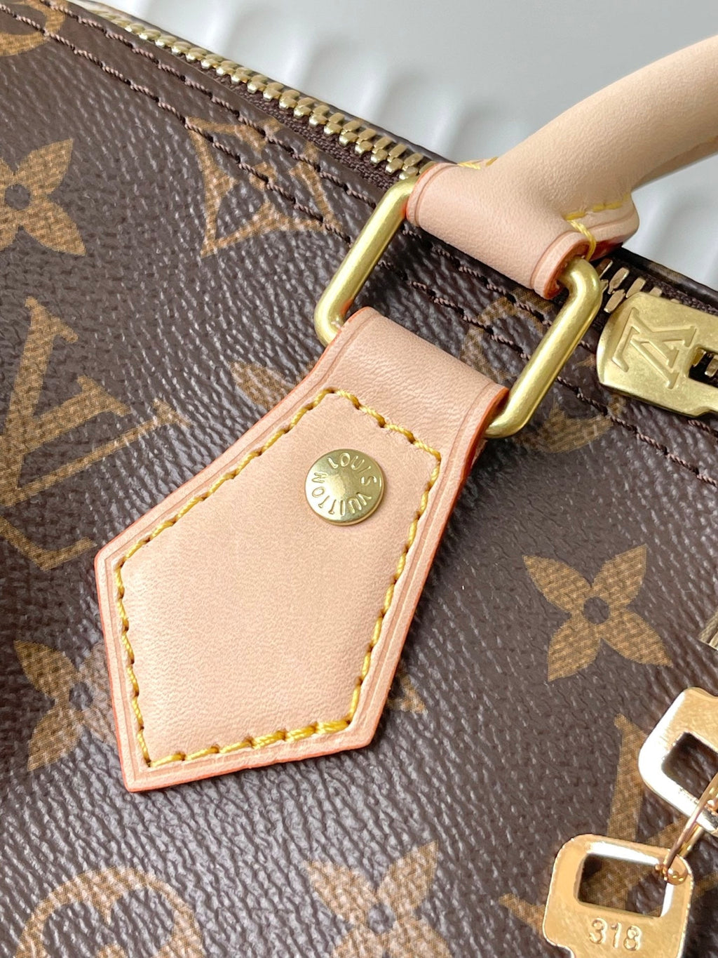 LOUIS VUITTON SPEEDY BANDOLIÈRE 25 IN BROWN MONOGRAM CANVAS GOLD HARDWARE