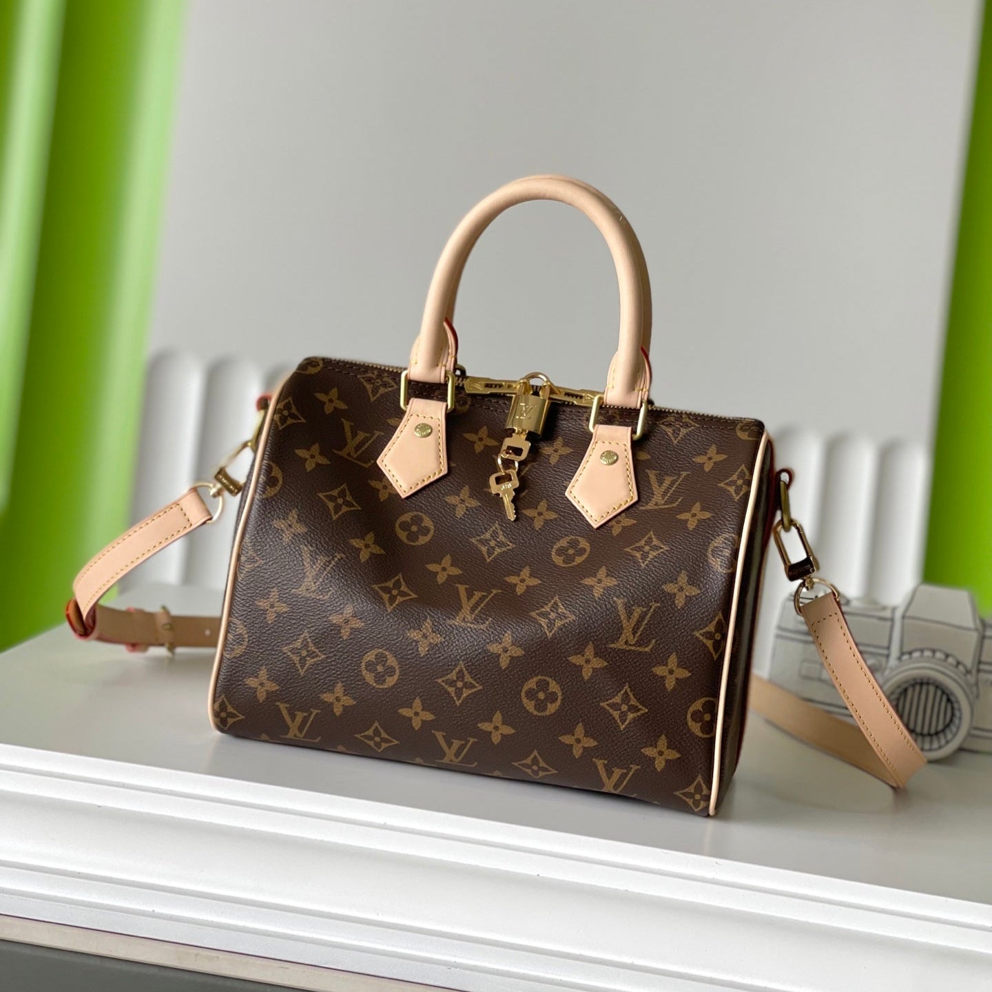 LOUIS VUITTON SPEEDY BANDOLIÈRE 25 IN BROWN MONOGRAM CANVAS GOLD HARDWARE