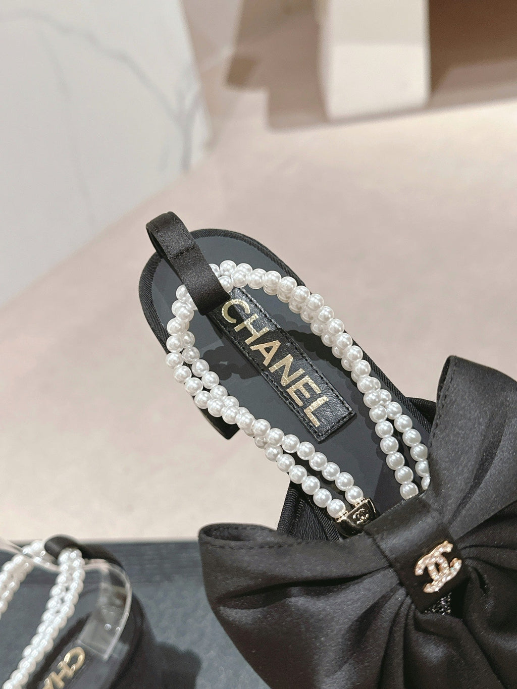 CHANEL HIGH SANDAL WITH PEARL CHAIN BLACK LAMBSKIN WITH RHINESTONES