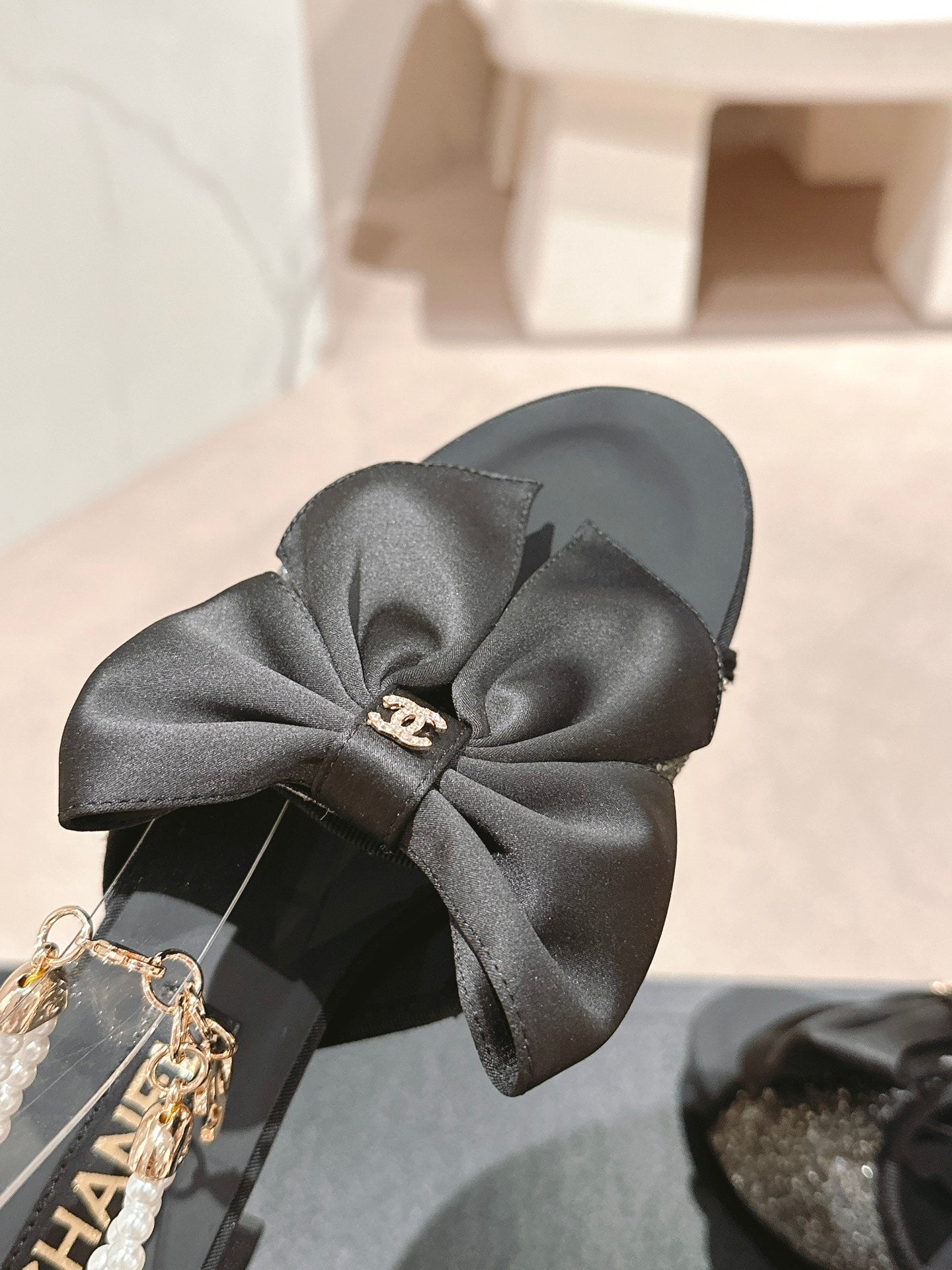CHANEL HIGH SANDAL WITH PEARL CHAIN BLACK LAMBSKIN WITH RHINESTONES