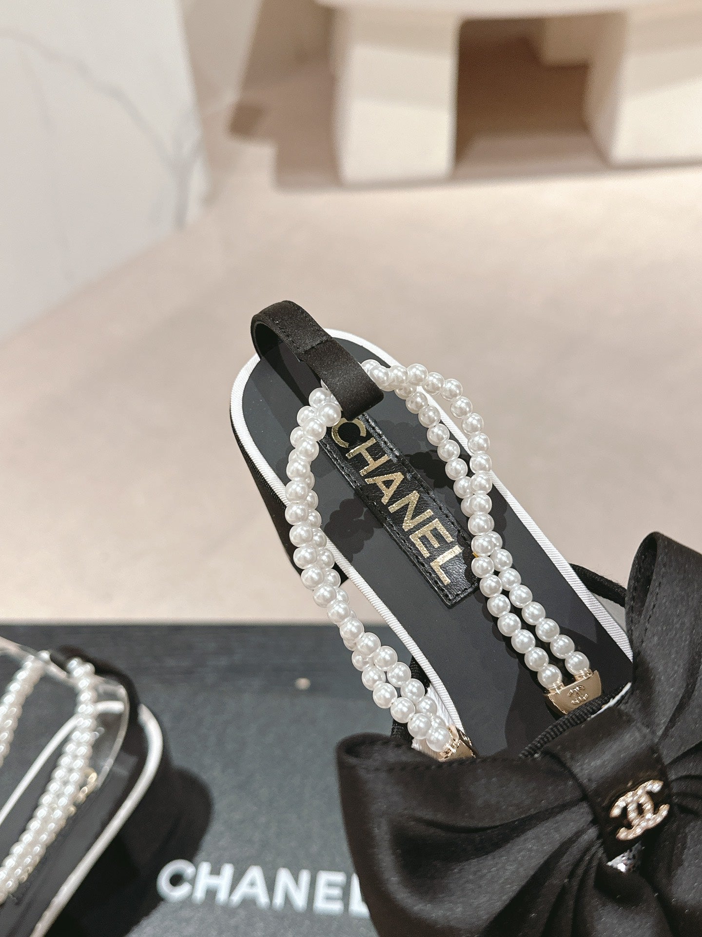 CHANEL HIGH SANDAL WITH PEARL CHAIN BLACK LAMBSKIN WITH WHITE RHINESTONES