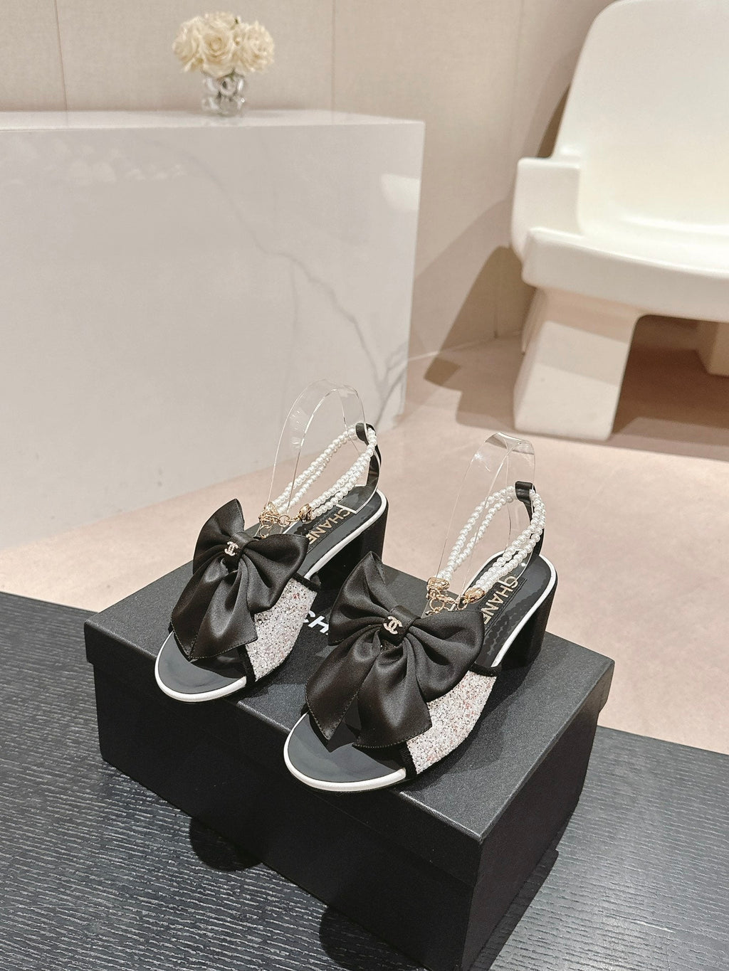 CHANEL HIGH SANDAL WITH PEARL CHAIN BLACK LAMBSKIN WITH WHITE RHINESTONES
