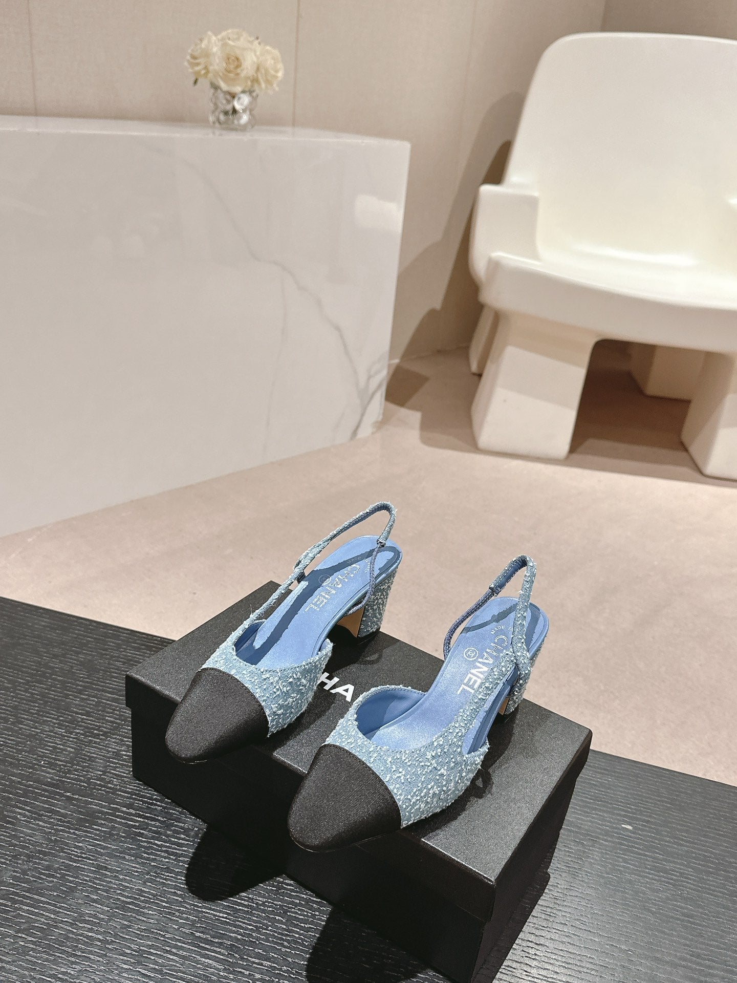 CHANEL HIGH SLINGBACKS IN LIGHT BLUE DENIM AND BLACK SATIN
