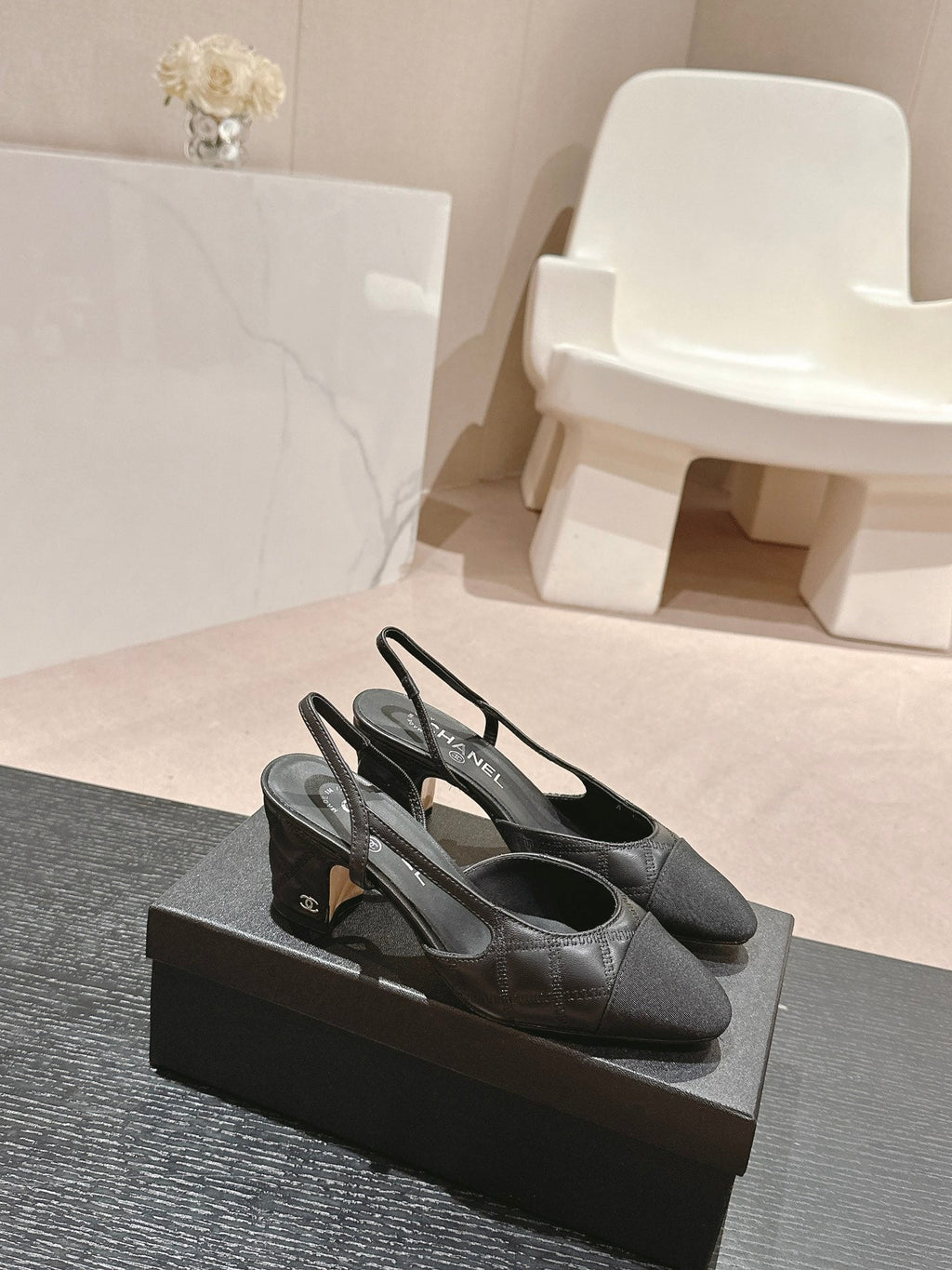 CHANEL HIGH SLINGBACKS IN BLACK LAMBSKIN AND SATIN