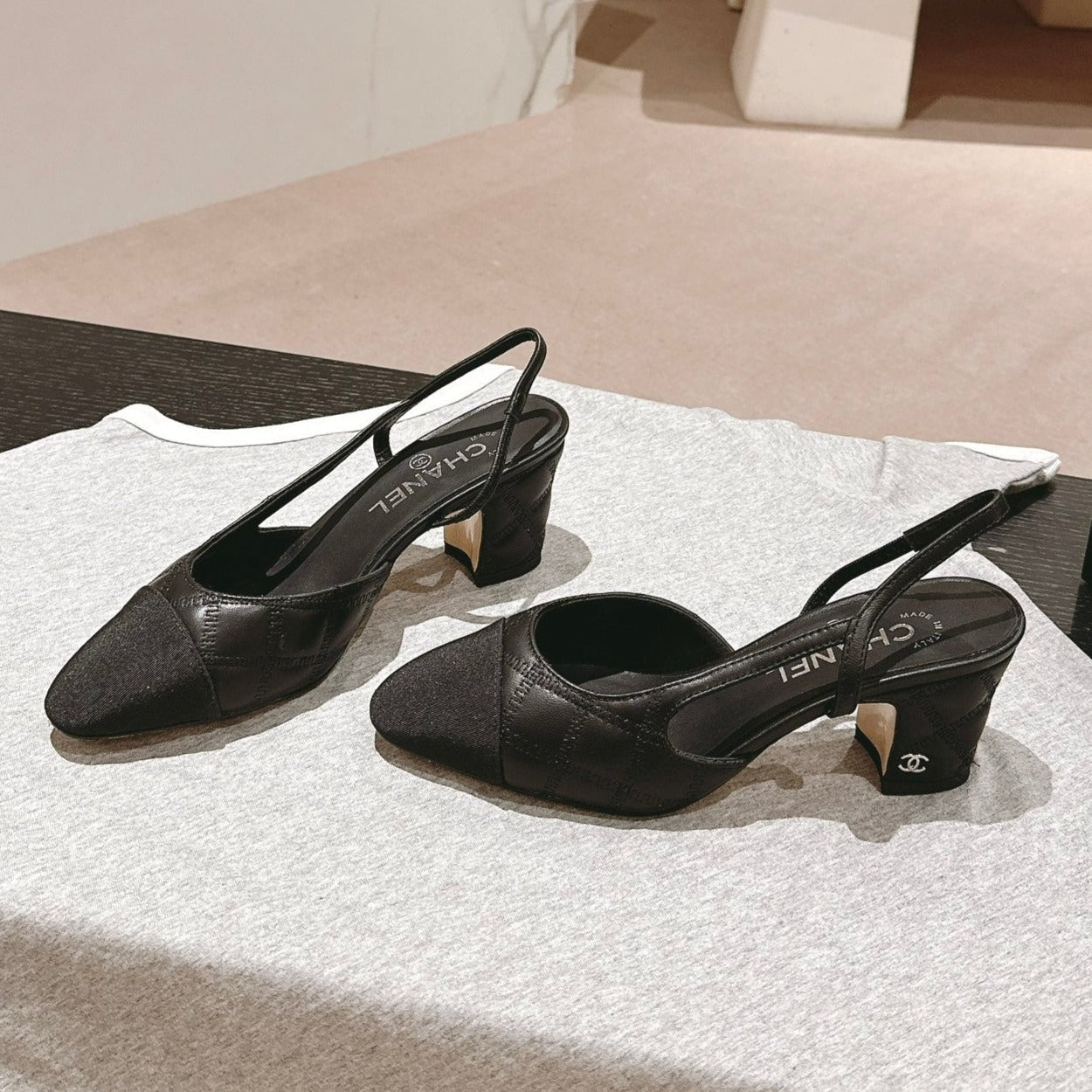 CHANEL HIGH SLINGBACKS IN BLACK LAMBSKIN AND SATIN