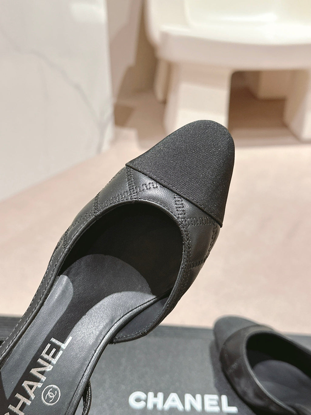 CHANEL HIGH SLINGBACKS IN BLACK LAMBSKIN AND SATIN