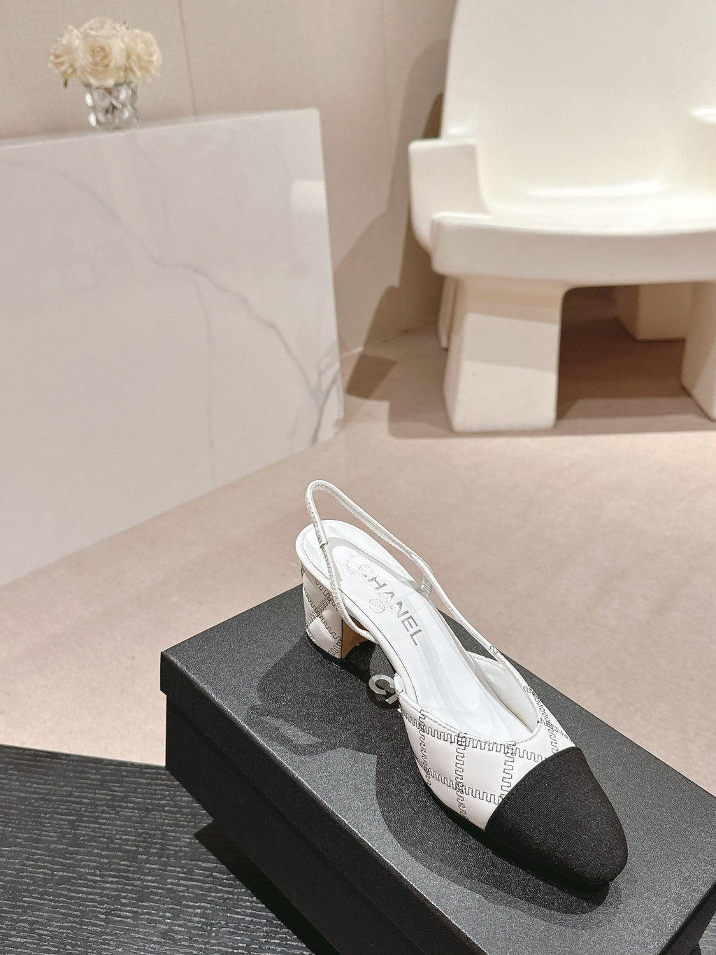 CHANEL HIGH SLINGBACKS IN WHITE LAMBSKIN AND BLACK SATIN