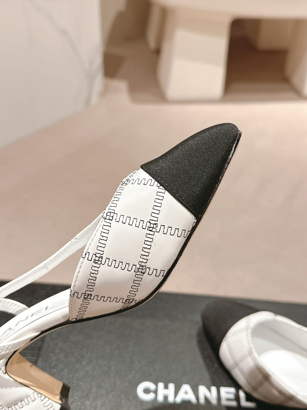 CHANEL HIGH SLINGBACKS IN WHITE LAMBSKIN AND BLACK SATIN