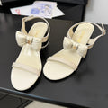 CHANEL MID HEEL SANDALS IN WHITE CALFSKIN WITH BOW