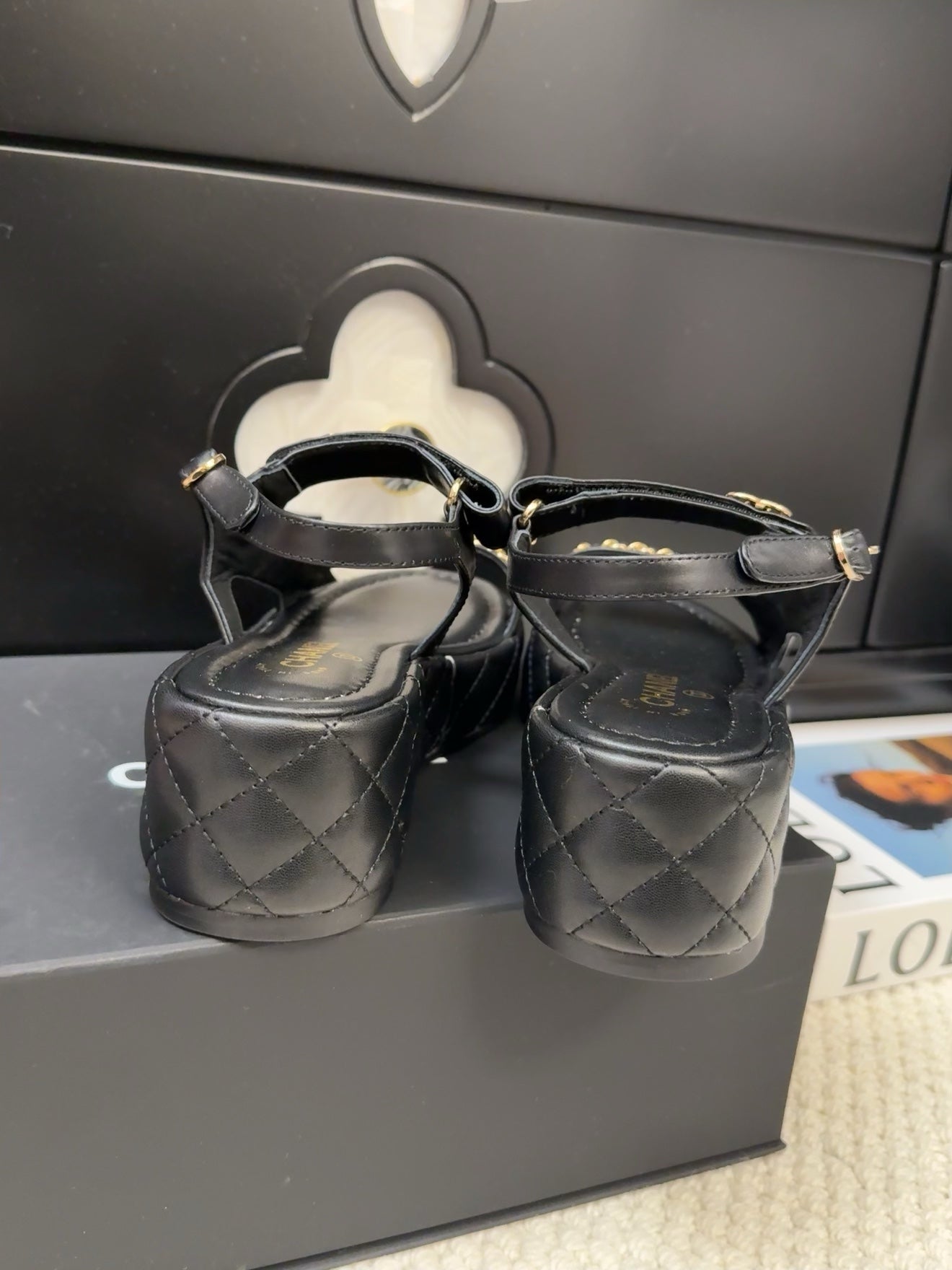 CHANEL THICK-SOLED SANDALS 55 MM IN BLACK CALFSKIN
