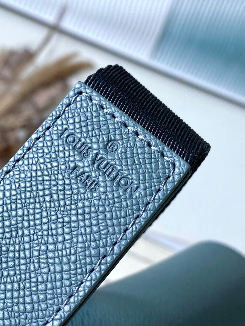 LOUIS VUITTON DISTRICT PM 26 IN CELESTE GREEN CALFSKIN